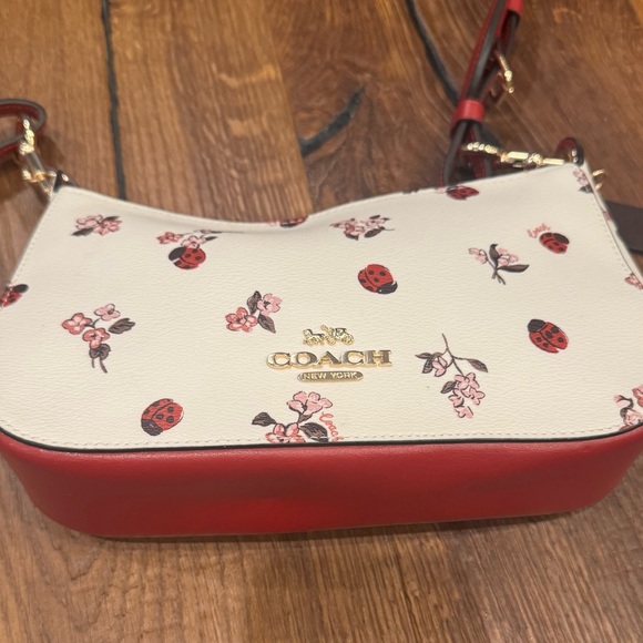 Coach Red and White Crossbody Bag with Floral and Ladybug Design - Picture 5 of 16